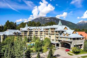 an image of a resort with mountains in the background at Cascade Lodge Studio-steps from village in Whistler