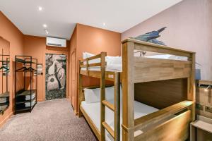 a bunk bed room with two bunk beds at Heeton Concept Hotel - Kensington London in London