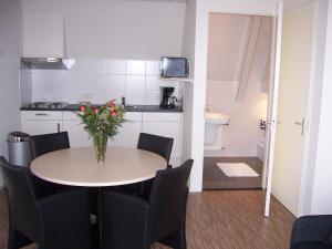Kuchyň nebo kuchyňský kout v ubytování Kodde Apartments