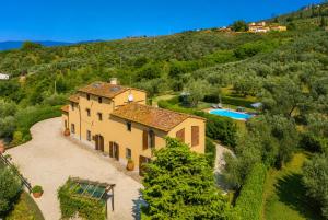 an aerial view of a house with a pool at Villa Le Balze Large Private Pool WiFi in Florence