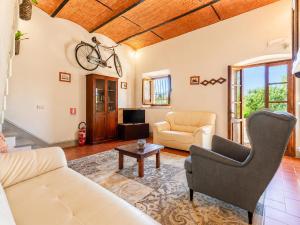 a living room with a couch and a table at Villa Le Balze Large Private Pool WiFi in Florence