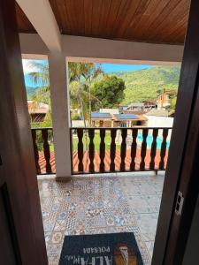 a view from the balcony of a house at Alfa Mar Pousada in Abraão