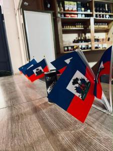 a group of opened umbrellas on the floor in a store at BAYO-HOTEl in Cap-Haïtien