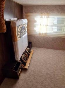 a box sitting on the floor next to a window at Debi in Lentekhi +15 photos