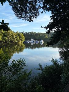 two boats are docked on a lake at Villa Bessa Nature & Spa in Fafe