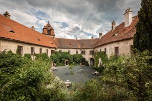 a large building with a courtyard and a tower at Burg Bernstein in Bernstein