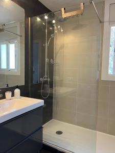 a bathroom with a shower and a sink at Panoramic 4 Apartments 2B in Castelldefels