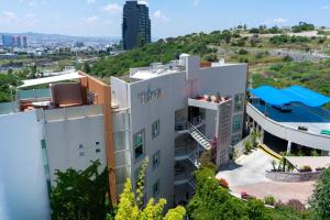 an aerial view of the hotel cacao with a pool at Apartment with Pool, Gym & A/C in Querétaro
