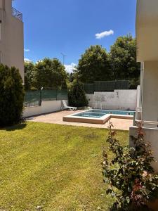 a yard with a swimming pool in a backyard at Byla Central Studio in Byala