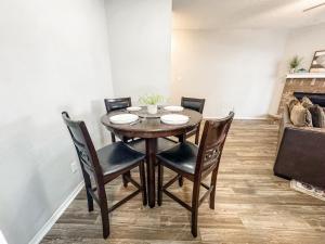 a dining room with a table and chairs at Spacious Poolside Oasis - Easy Access and Garage in Corpus Christi