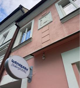 a building with a sign on the side of it at WanaBark Hotel - The Ultimate Dogs-friendly Spot in Bratislava in Bratislava