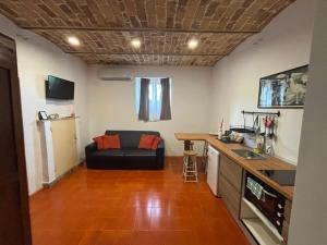 a living room with a couch and a table at Casa Simon in Lanciano +4 photos