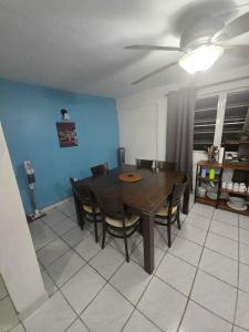 a dining room with a table and chairs at Above The Plaza 4 (6 guest) in Rincon +9 photos