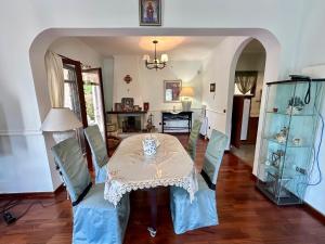 a dining room with a table and some chairs at Villa Leo in Bar