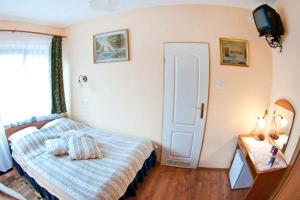 Łóżko lub łóżka w pokoju w obiekcie Victoria Rooms
