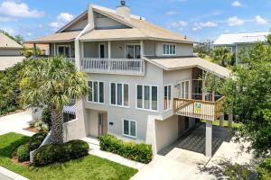 an aerial view of a house with a balcony at Madelyn's Oceanview in Tybee Island