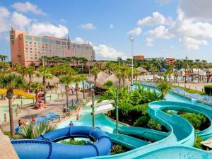 a water park at a resort with a water slide at Charming 1BR Getaway - Private, Pet Friendly, TV in Texas City