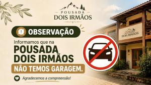 a sign in front of a house with a no parking sign at Pousada Dois Irmãos in Uberaba