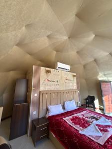 a room with a bed in a tent at Rehana rum luxury camp in Wadi Rum