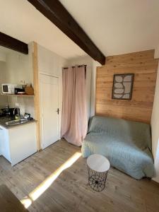 a bedroom with a bed and a sink in a room at Gallice Bey in Briançon