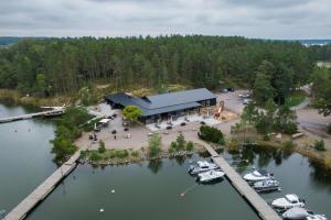 an aerial view of a marina with boats in the water at Kustavin Lootholma in Kustavi
