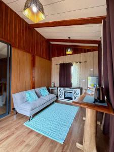 a living room with a couch and a table at Kokoro Garden in Fortuna