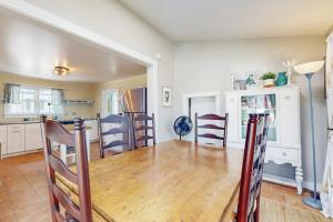 a kitchen and dining room with a table and chairs at Beautiful Retreat | Home Office | Walk 5 MInutes to Main Street in Wiscasset