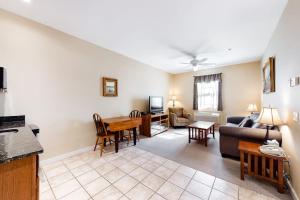 a living room with a couch and a table at Comfortable Suite in Downtown Northeast Harbor w/ WiFi & AC - Walk to the Water in Northeast Harbor