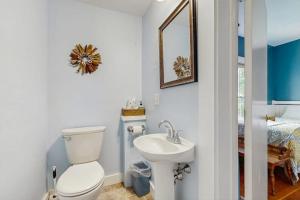 a bathroom with a toilet and a sink at Dog-Friendly House with WiFi and Deck - Near the Water, Eateries, and Shopping in Bar Harbor +11 photos