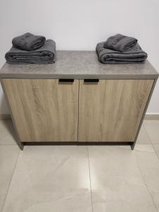 a counter with two towels sitting on top of it at Dani's Sea Breeze in Oran +41 photos