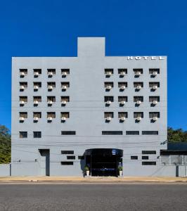 a building with a hotel on the side of it at klein Ville Esteio Br in Esteio