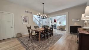 a dining room and living room with a table and chairs at Prairie View in Sawyer