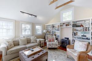 a living room with a couch and a table at Historical New England home, outdoor shower , Dog-friendly in Boothbay Harbor