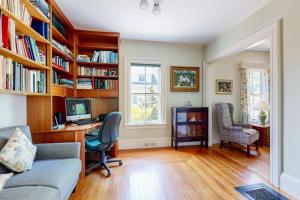 a home office with a computer and a desk at Parker House: Historic home - walk downtown, dog-friendly & washer/dryer in Camden