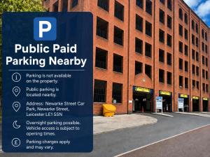 a parking sign in front of a brick building at Sangha House - Ensuite Rooms with Shared Kitchen Facilities in Leicester