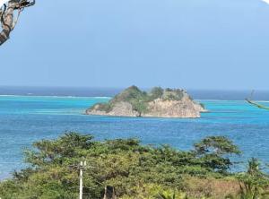 an island in the middle of the ocean at Posada MaiMai in Providencia