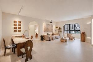 a living room with a couch and a table at Lucky Designer Residence Near Bell Tower & City Wall in Xi'an