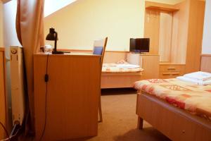 Uma cama ou camas num quarto em Hotel Clavis