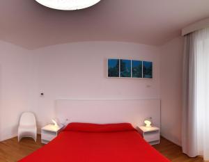 Postel nebo postele na pokoji v ubytování Felix Hotels - Residence Hotel Grandi Magazzini
