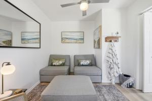 a living room with two chairs and a couch at The Birch in Wellington