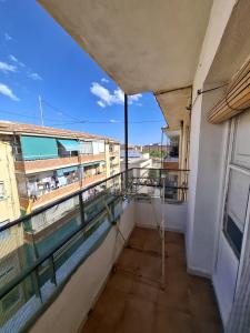 a balcony with a view of a building at Leidy in Alicante