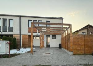 a house under construction with a wooden structure at Concept Residence in Târgu-Mureş