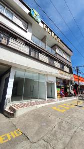 a building with a sign on the front of it at Euros Hotel in El Bordo