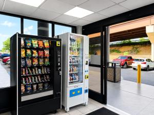 a vending machine in a store with drinks at Studio 6 Springfield VA Washington DC Southwest in Springfield