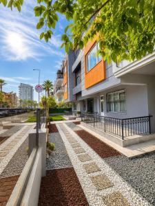 a walkway in front of a building at Berm Suites in Antalya