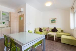 Posedenie v ubytovaní Apartments Villa Alba