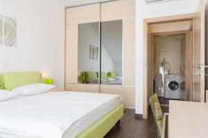 Posteľ alebo postele v izbe v ubytovaní Apartments Villa Alba
