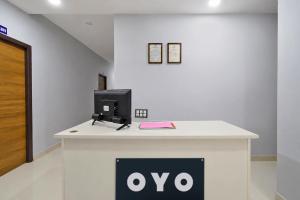 aiya sign on a counter with aiya sign on it at Hotel O OASIS Inn in Ibrāhīmpatan