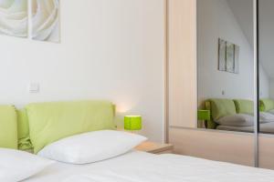 Posteľ alebo postele v izbe v ubytovaní Apartments Villa Alba