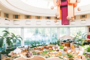 a rendering of the lobby of the trump international hotel casino at Laguna Garden Hotel in Ginowan +198 photos